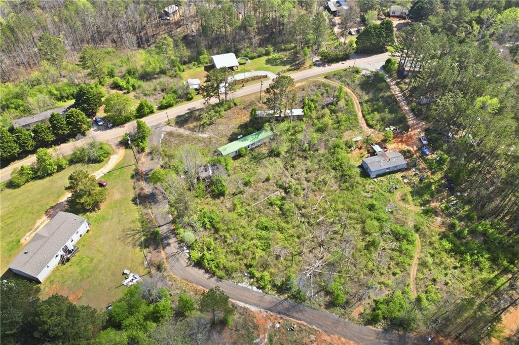 17 Line Crest Drive Ball Ground, GA 30107 - Photo 5 of 18 an aerial view of residential houses with outdoor space