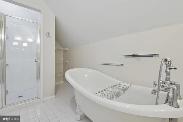 a bathroom with a sink mirror and toilet