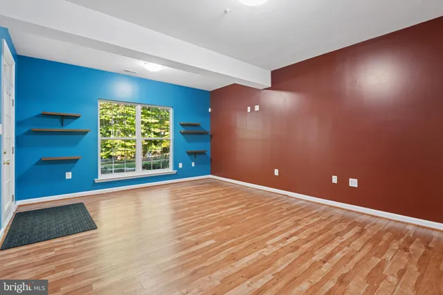 a view of a deck with wooden floor and fence