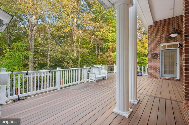 an aerial view of a house with outdoor space
