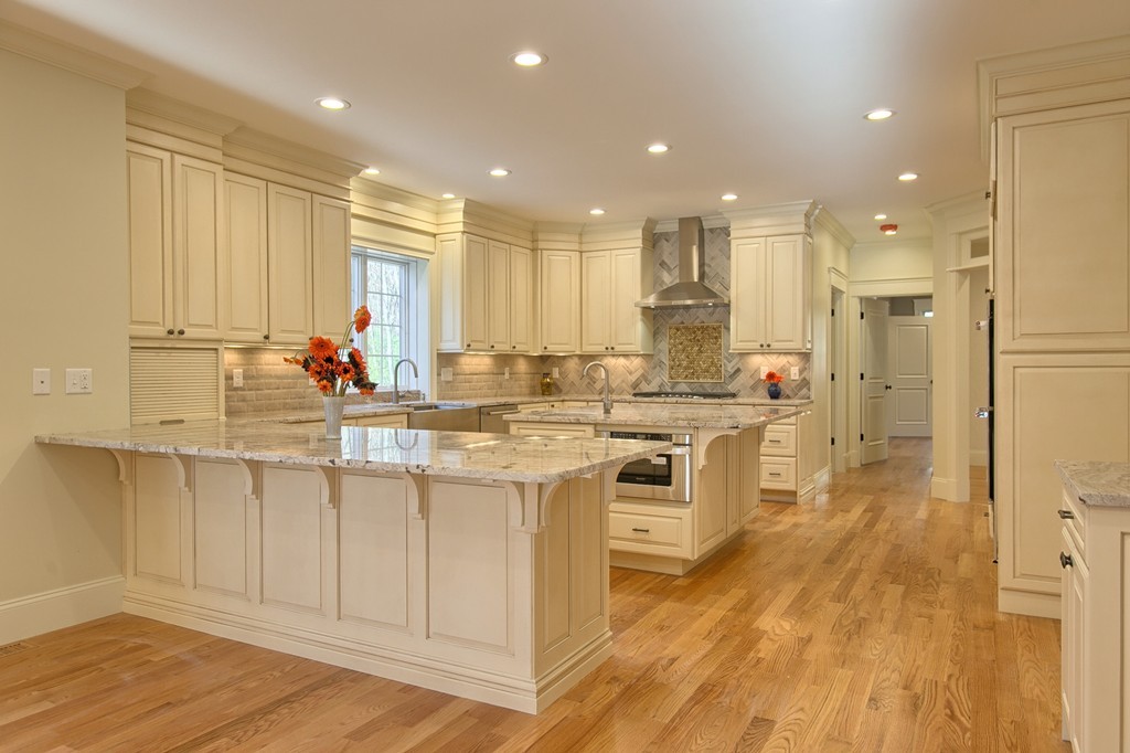 72 Tenney Road Westford, MA 01886 - Photo 8 of 30 a kitchen with counter top space sink stove and refrigerator