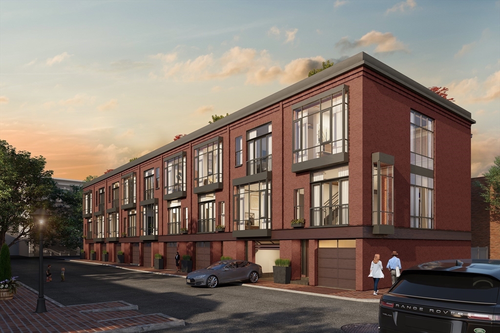 1-17 Edgerly Place, Unit 3 Boston, MA 02116 - Photo 2 of 8 a front view of building with lot of windows