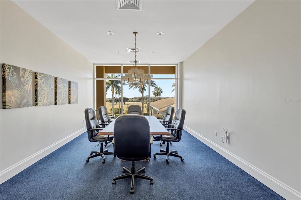 140 Riviera Dunes Way, Unit 206 Palmetto, FL 34221 - Photo 27 of 46 a view of a dining room with furniture window and outside view