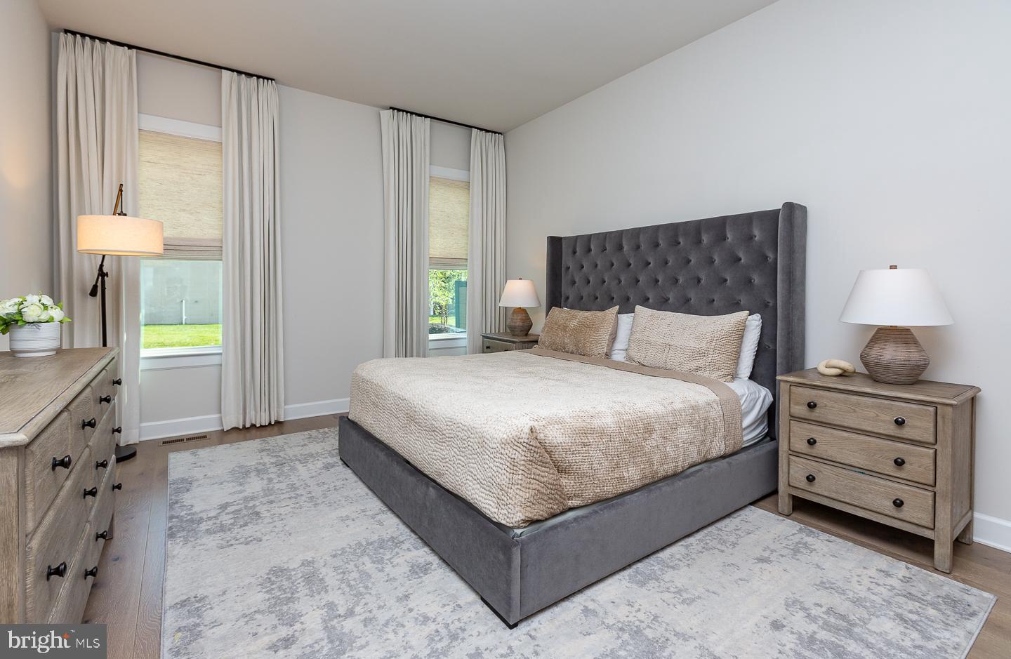 21 The Lane Wayne, PA 19087 - Photo 16 of 57 a bedroom with a bed and a window