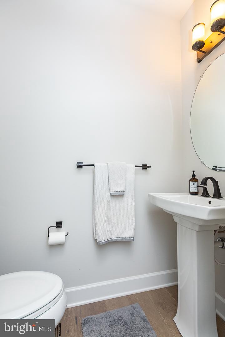 21 The Lane Wayne, PA 19087 - Photo 24 of 57 a bathroom with a sink and a toilet