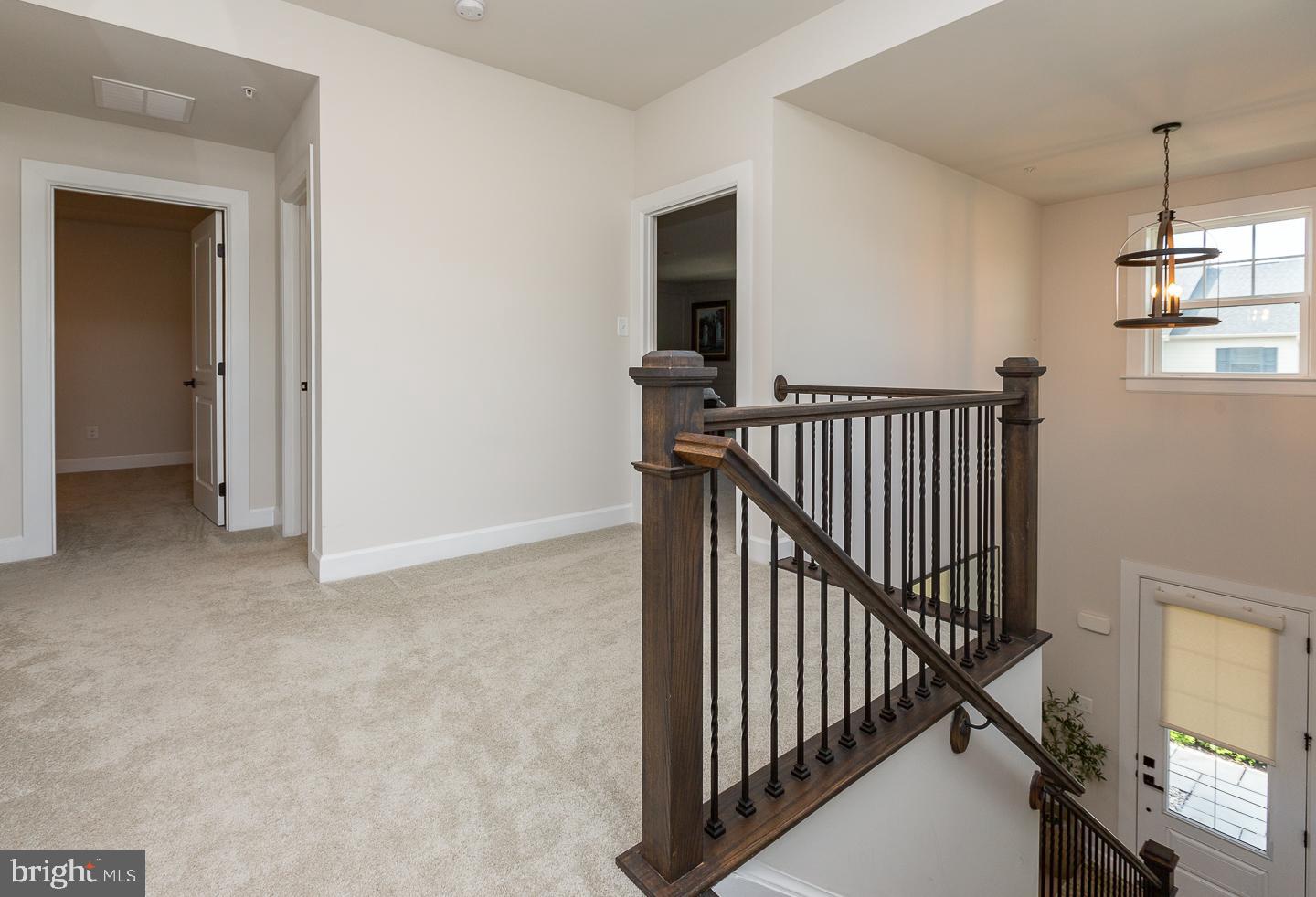 21 The Lane Wayne, PA 19087 - Photo 26 of 57 a view of a hallway with windows and stairs