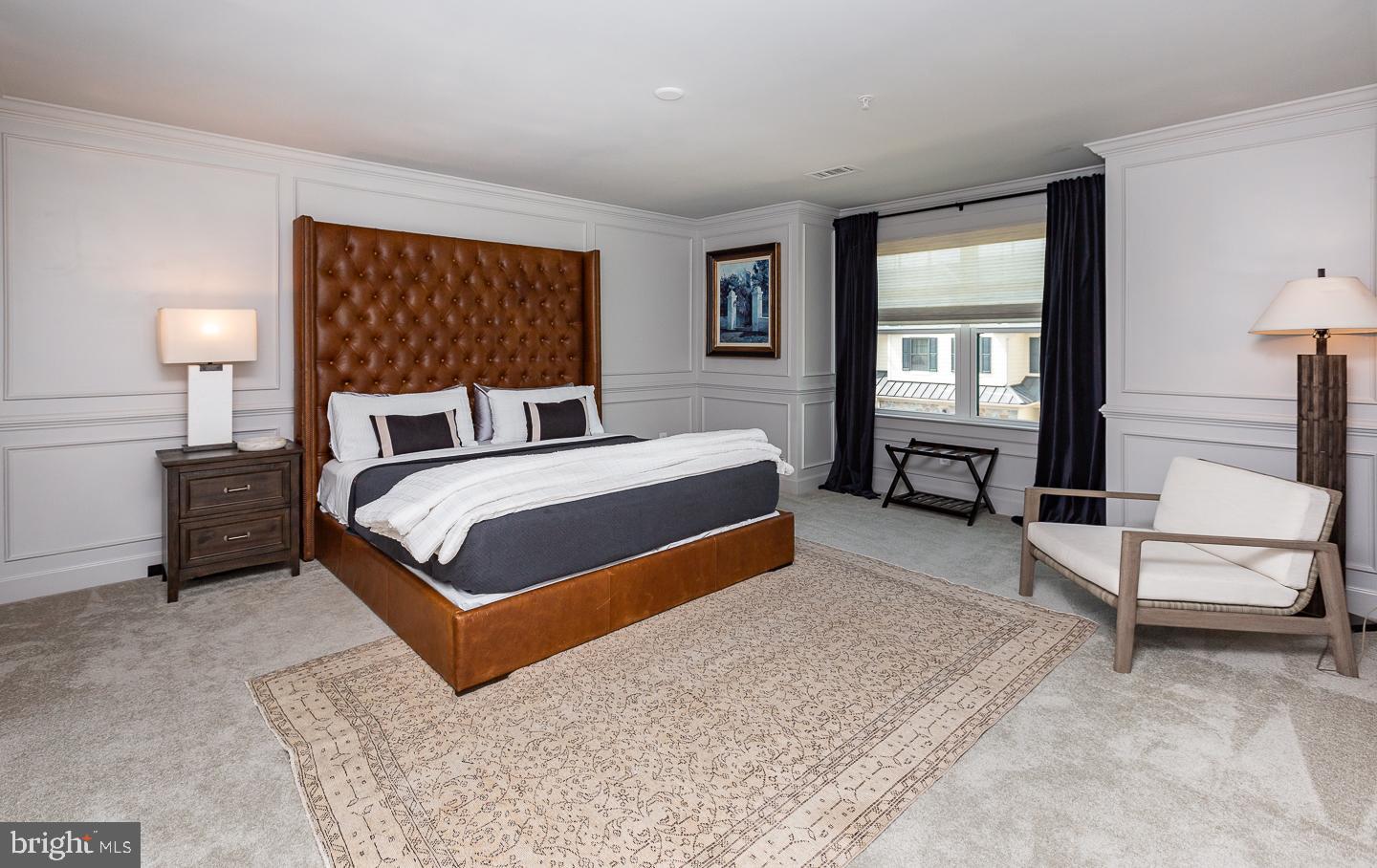 21 The Lane Wayne, PA 19087 - Photo 27 of 57 a bedroom with a bed wooden floor and window