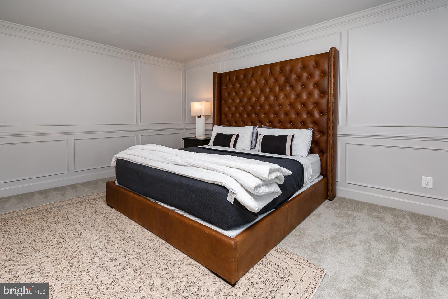 21 The Lane Wayne, PA 19087 - Photo 28 of 57 a bedroom with a bed and cabinet