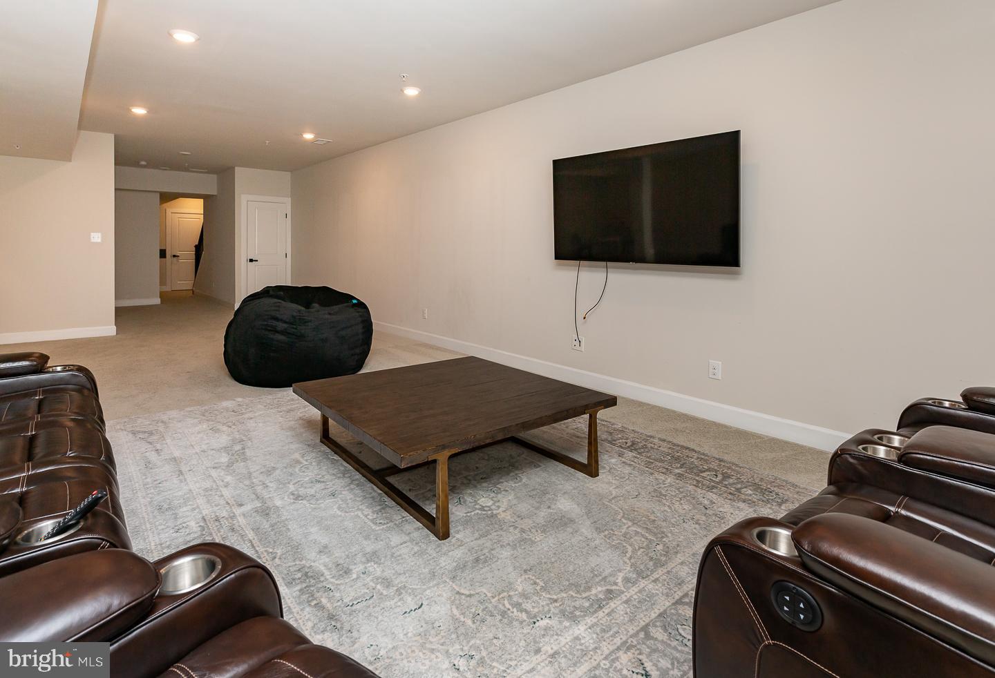 21 The Lane Wayne, PA 19087 - Photo 43 of 57 a living room with furniture and a flat screen tv