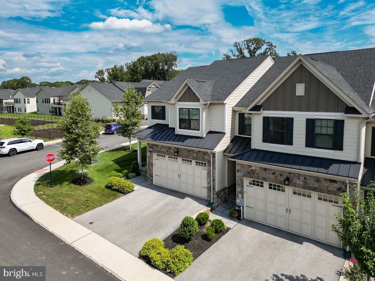 21 The Lane Wayne, PA 19087 - Photo 50 of 57 front view of a house with a yard