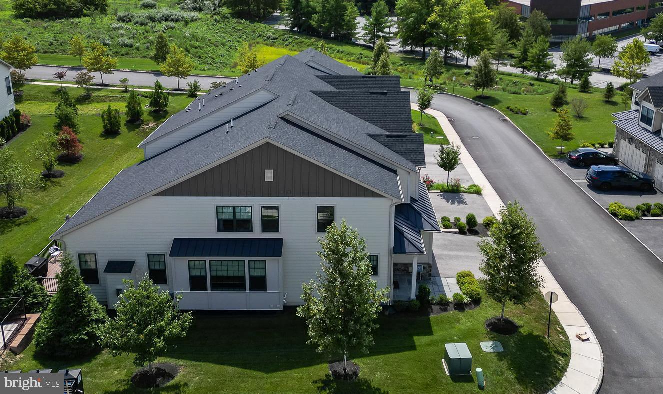 21 The Lane Wayne, PA 19087 - Photo 57 of 57 a aerial view of a house with a yard