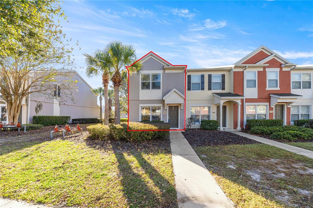 4908 Southwest 45th Circle Ocala, FL 34474 - Photo 1 of 1 a front view of a house with a yard