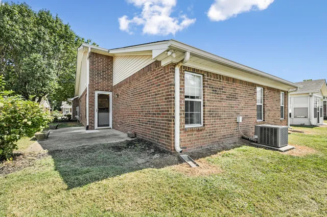 a front view of house with yard