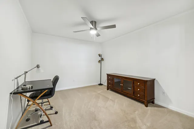 a room with table and chairs