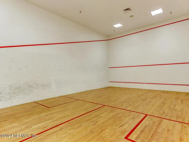 a view of a lake with a city skyline in the background