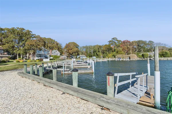 a view of a balcony with chairs