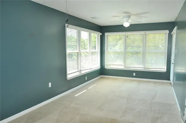 a kitchen with a stove and a microwave