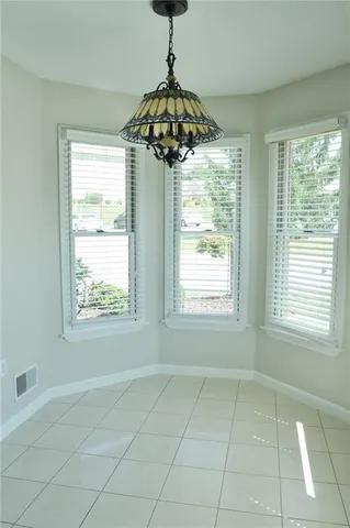 a window in a room next to a window