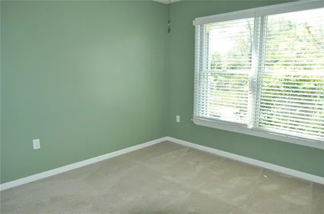 a bathroom with a sink mirror vanity and toilet
