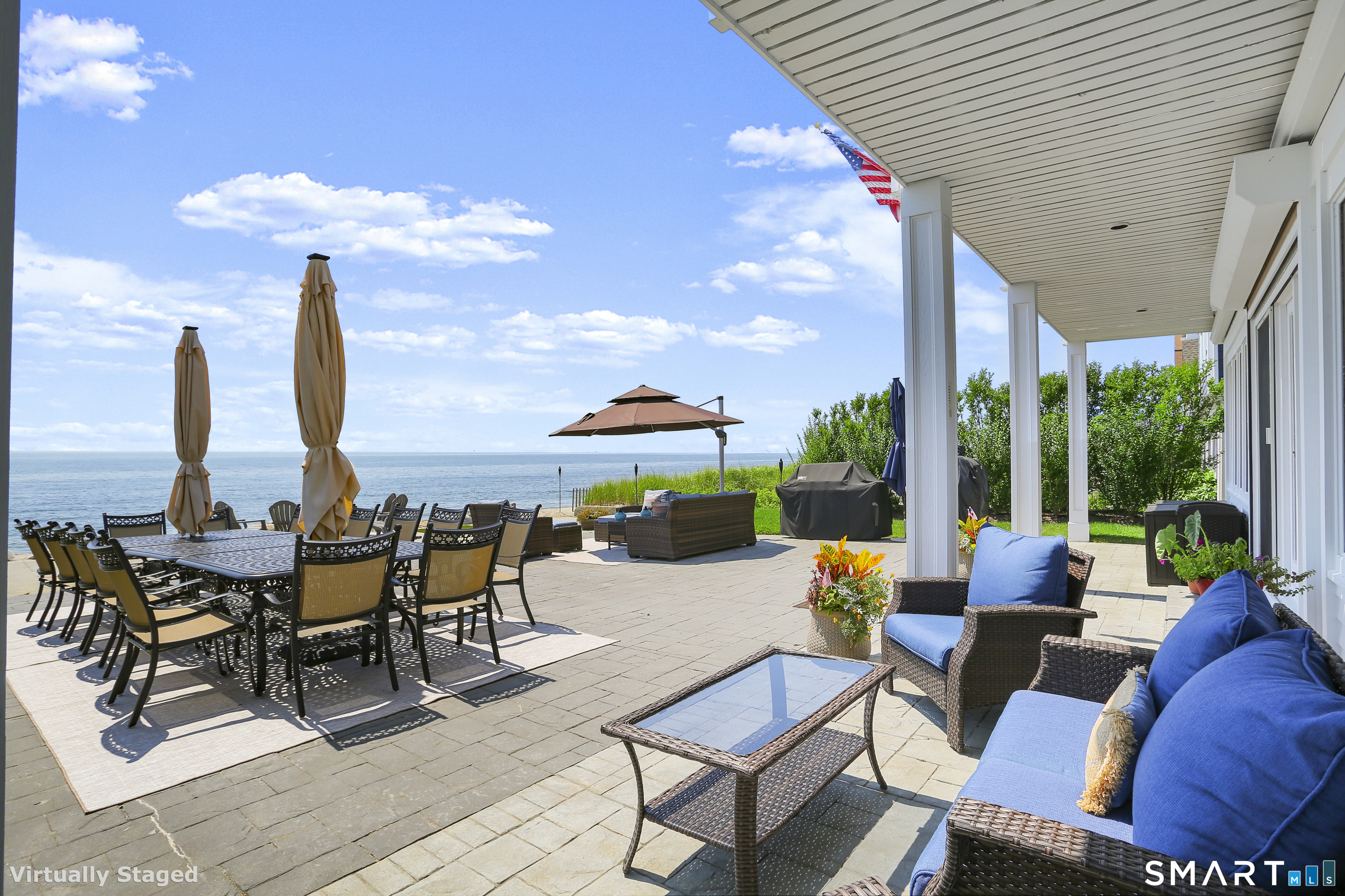 1149 Fairfield Beach Road Fairfield, CT 06824 - Photo 29 of 40 Expansive waterfront patio offers really great covered space, perfect to sit and sip your morning coffee (shown here w/former patio & furniture arrangement )