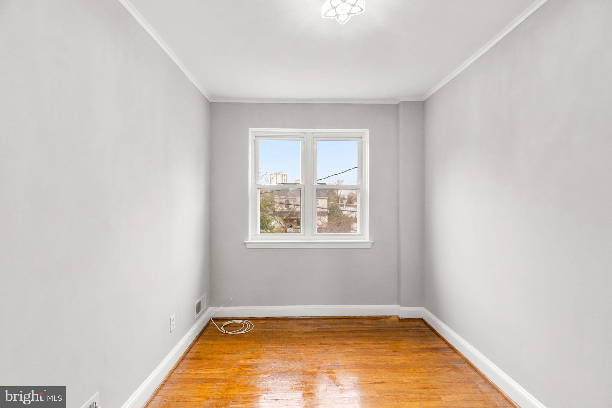 134 Marburth Avenue Baltimore, MD 21286 - Photo 14 of 27 a view of a room with window