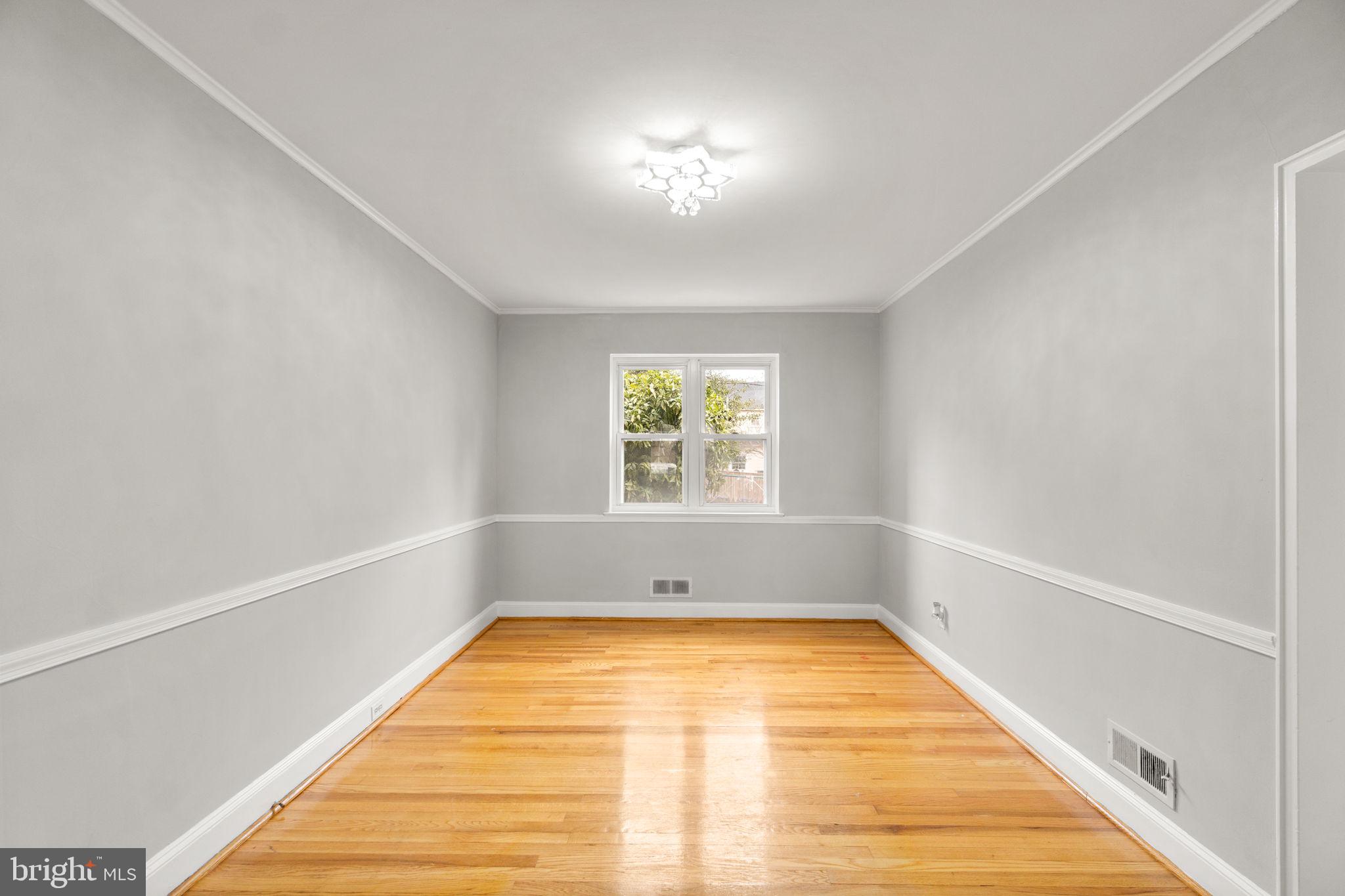 134 Marburth Avenue Baltimore, MD 21286 - Photo 6 of 27 a view of empty room with window