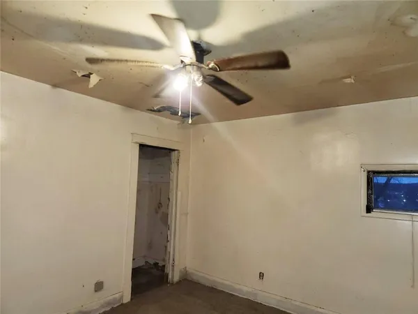 a view of a bathroom with a glass door