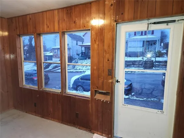 a view of hallway with windows