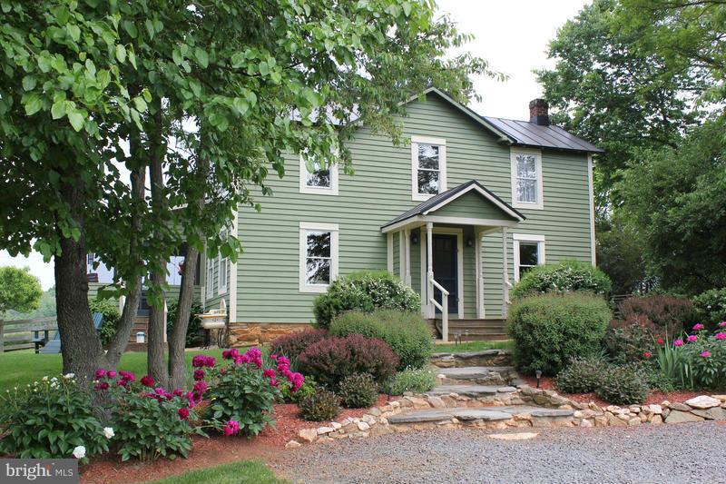31 Starks Road Washington, VA 22747 - Photo 1 of 30 a front view of a house with a garden