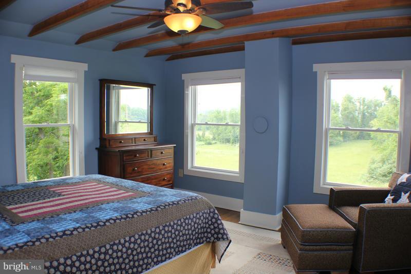 31 Starks Road Washington, VA 22747 - Photo 19 of 30 a bedroom with a bed and a window