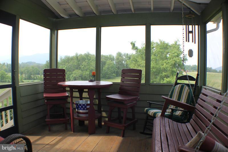 31 Starks Road Washington, VA 22747 - Photo 24 of 30 a view of a patio with chairs and a grill
