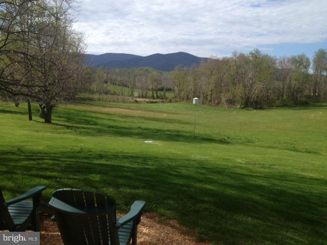 31 Starks Road Washington, VA 22747 - Photo 27 of 30 a view of a grassy field with an trees