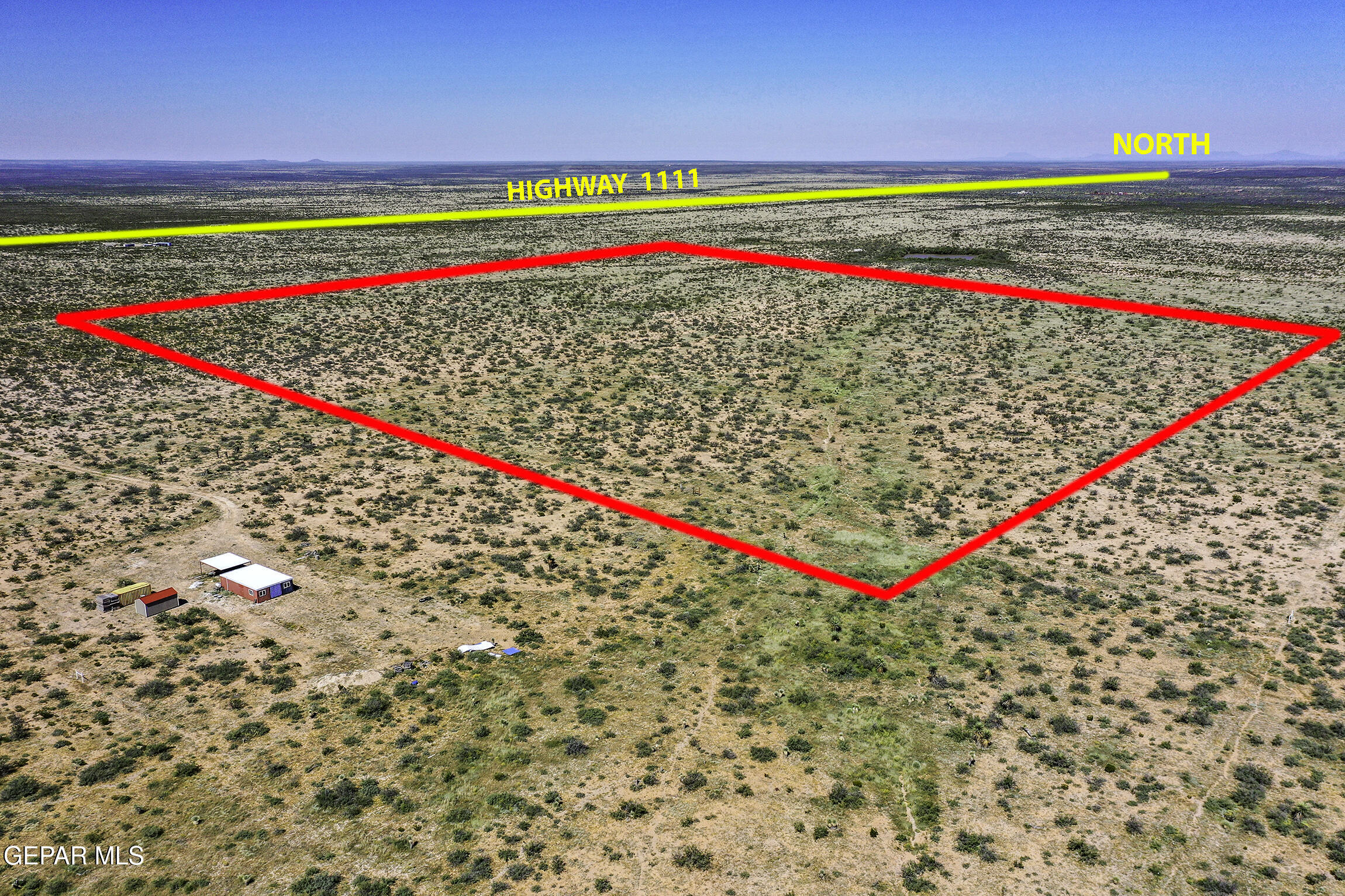 76041-4 Pn Ranch, Unit 617 Sierra Blanca, TX 79851 - Photo 6 of 28 a view of a tennis court with wooden fence
