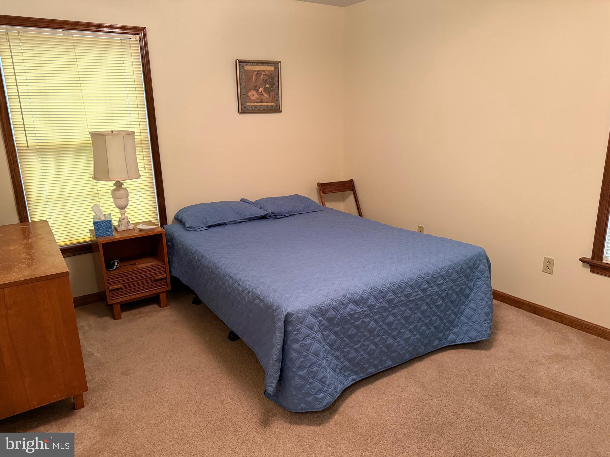 7206 Old Dickersons Road Orange, VA 22960 - Photo 15 of 32 a bedroom with a bed and a window