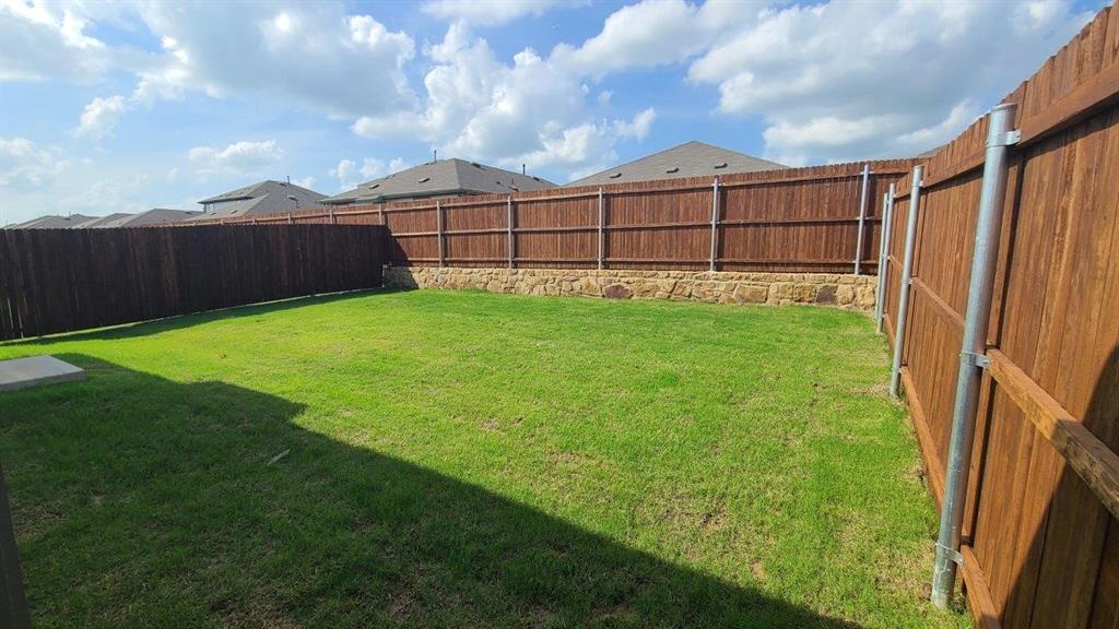 5420 Corduroy Road Krum, TX 76249 - Photo 14 of 15 Yard - All Home and community information, including pricing, included features, terms, availability and amenities, are subject to change at any time without notice or obligation. All Drawings, pictures, photographs, video, square footages, floor plans, elevations, features, colors and sizes are approximate for illustration purposes only and will vary from the homes as built.