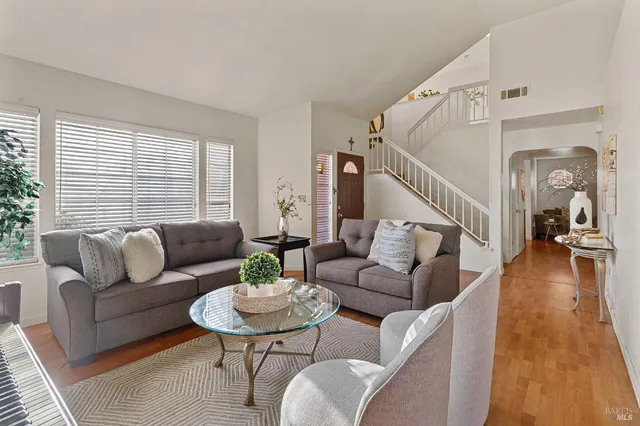 a kitchen with stainless steel appliances granite countertop a stove sink and cabinets