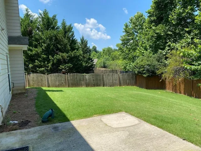 a view of a backyard with a garden