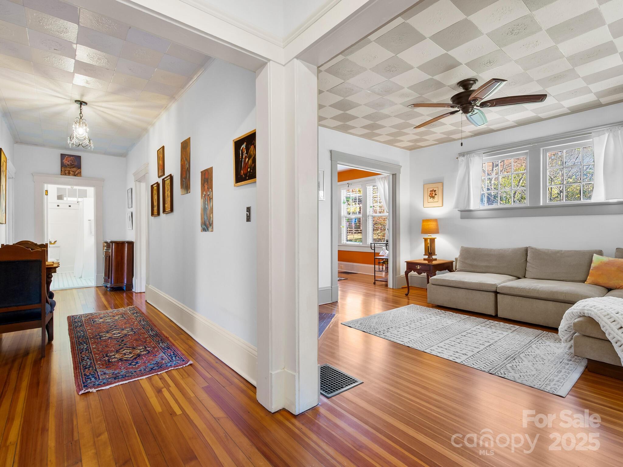127 Pennsylvania Avenue Asheville, NC 28806 - Photo 6 of 48 a living room with furniture and a rug