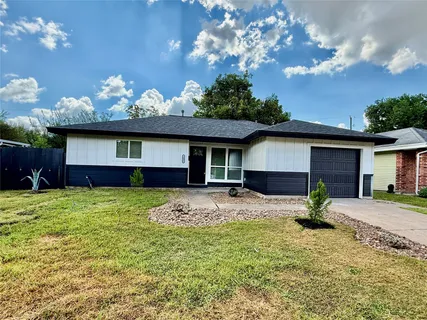 a house view with a garden space