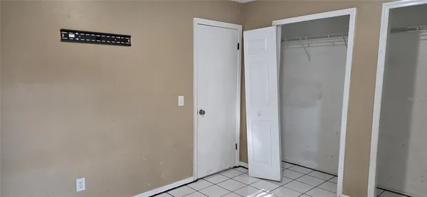 a white bath tub sitting next to a toilet