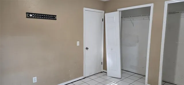 a white bath tub sitting next to a toilet