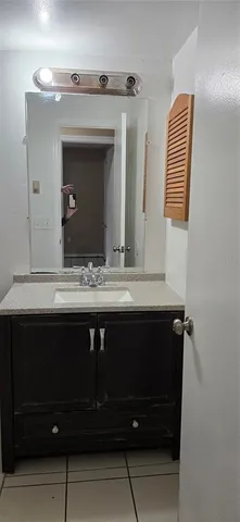 a white toilet sitting next to a toilet