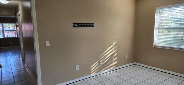 a view of an empty room and window