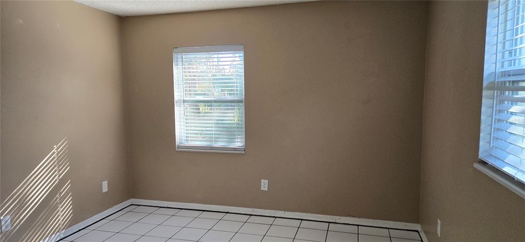 2530 Georgia Avenue, Unit B Sanford, FL 32773 - Photo 36 of 48 a view of an empty room with a window