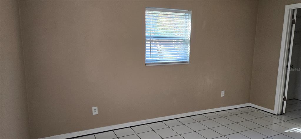 2530 Georgia Avenue, Unit B Sanford, FL 32773 - Photo 37 of 48 an empty room with windows