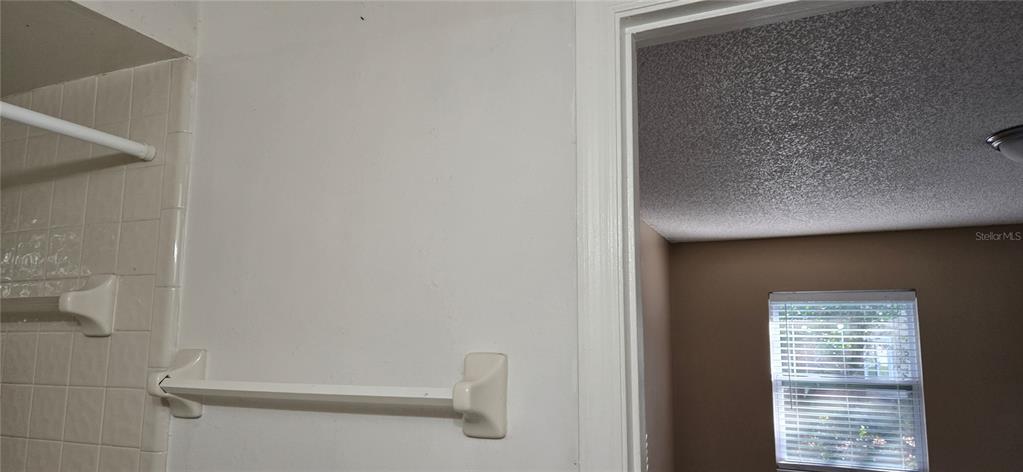 2530 Georgia Avenue, Unit B Sanford, FL 32773 - Photo 44 of 48 a bathroom with a window