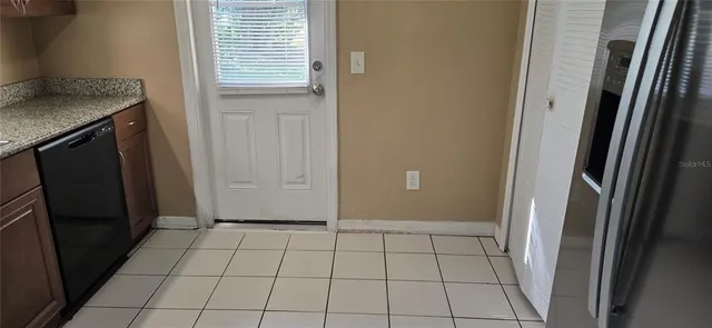 a kitchen with granite countertop a sink and a granite counter tops