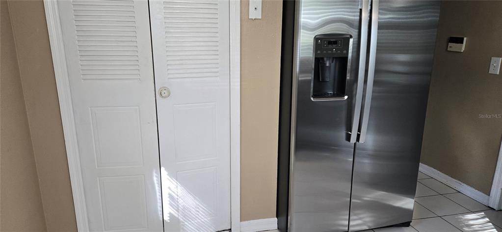 2530 Georgia Avenue, Unit B Sanford, FL 32773 - Photo 9 of 48 a bathroom with a glass shower door