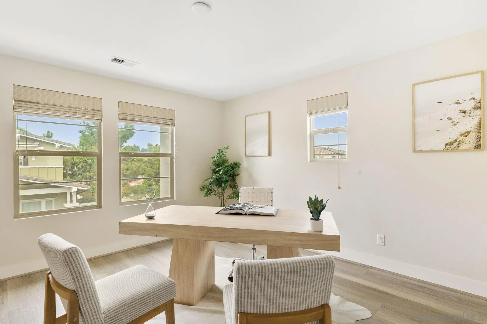 1676 Shorebreak Way Encinitas, CA 92024 - Photo 15 of 61 a living room with furniture and a window