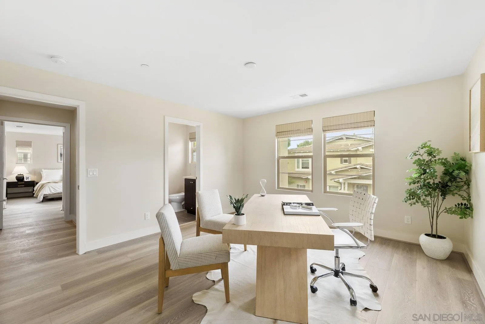 1676 Shorebreak Way Encinitas, CA 92024 - Photo 19 of 61 a workspace with furniture window and wooden floor